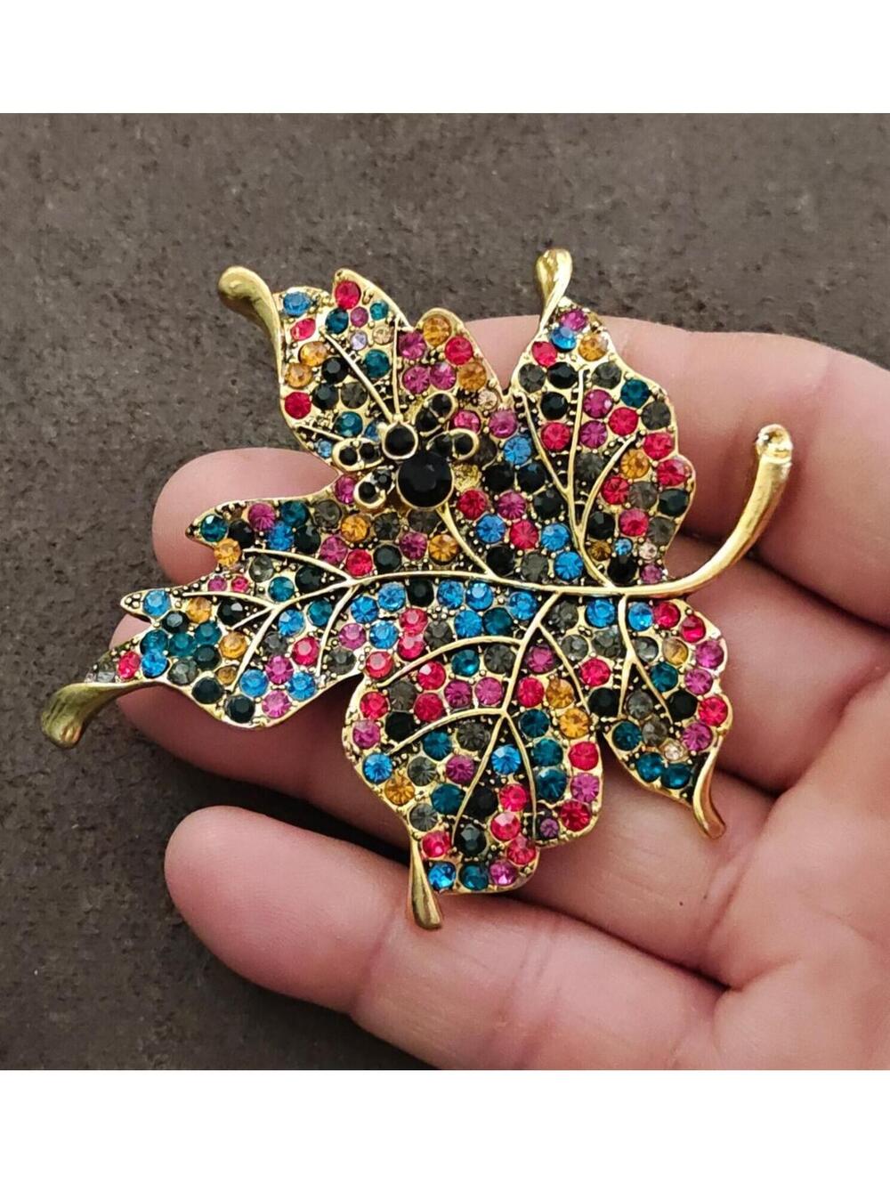 1980s Gold Tone Maple Leaf With Multi Colored Rhinestones Brooch